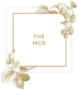Sign saying the mcr in square with floral decorations