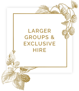 Sign saying Larger groups & exclusive hire in square with floral decorations