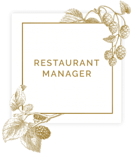 Sign saying restaurant manager in square with floral decorations